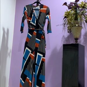 Janette abstract low cut jumpsuit w/ belt Sz L